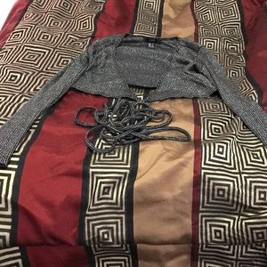 A tie around Half a shirt black and Silver